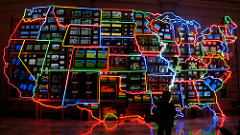 Electronic Superhighway Nam June Paik. 1995 C.E. Mixed-media installation (49-channel closedcircuit video installation, neon, steel, and electronic components). It is an enormous physical object that occupies a middle ground between the virtual reality of the media and the sprawling country beyond our doors.