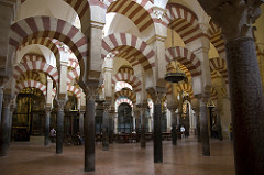 Great Mosque Córdoba, Spain. Umayyad. c. 785-786 C.E. Stone masonry The Great Mosque of Cordoba is a prime example of the Muslim world's ability to brilliantly develop architectural styles based on pre-existing regional traditions. It is built with recycled ancient Roman columns from which sprout a striking combination of two-tiered, symmetrical arches, formed of stone and red brick.