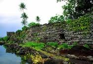 Nan Madol Pohnpei, Micronesia. Saudeleur Dynasty. c. 700-1600 C.E. Basalt boulders and prismatic columns The megalithic architecture that characterizes the site consists of long, naturally prismatic log-like basalt stones which were often built up over foundations of large basalt boulders to form high-walled rectangular enclosures. This type of architecture occurs only sporadically on the main island which suggests that the people who used these structures were of very high status.
